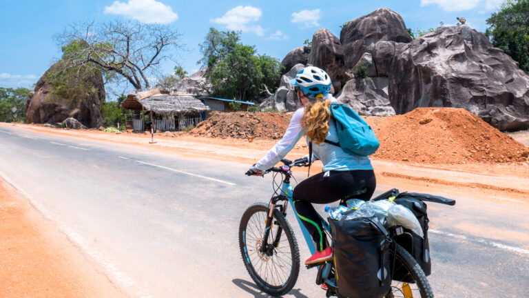 Cycling,On,A,Road,During,A,Long,Trip,With,Bags